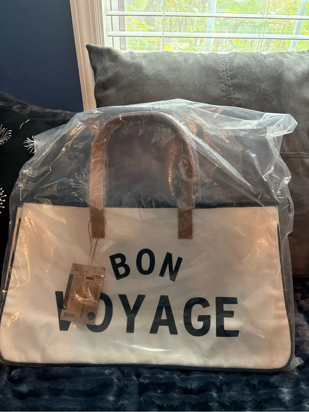 Santa Barbara Design Studio Bon Voyage Canvas Tote Bag in Cream and Black